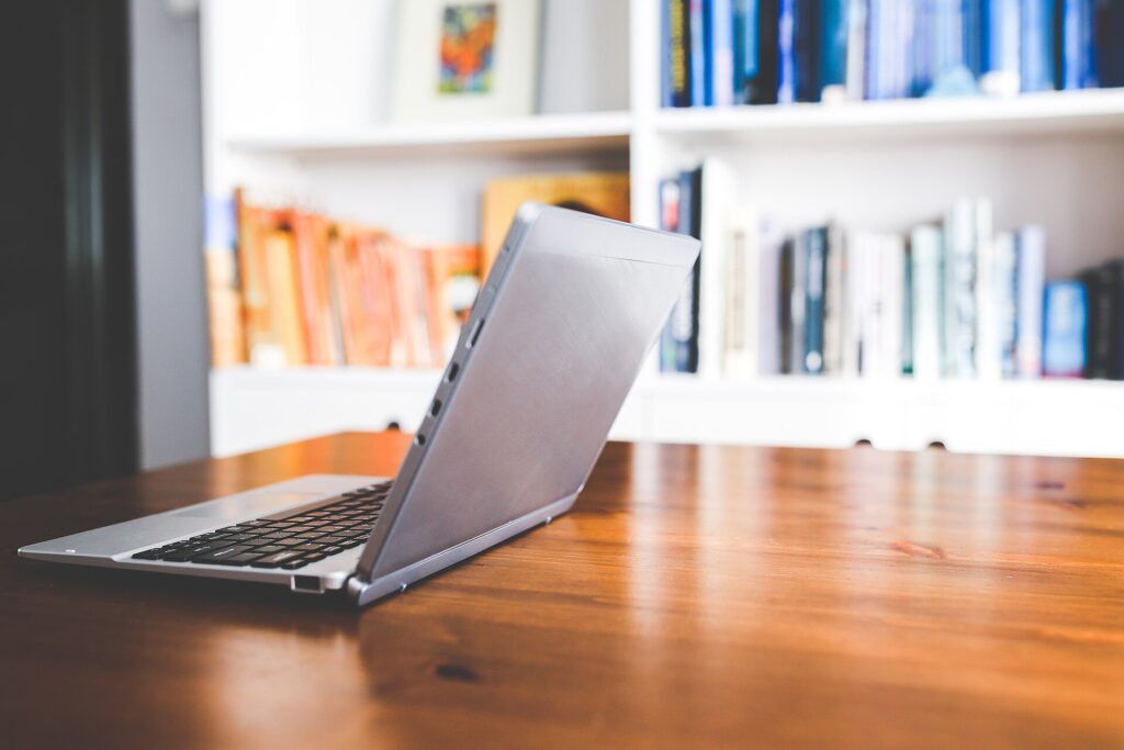 A laptop on a desk, ready for a remote working day